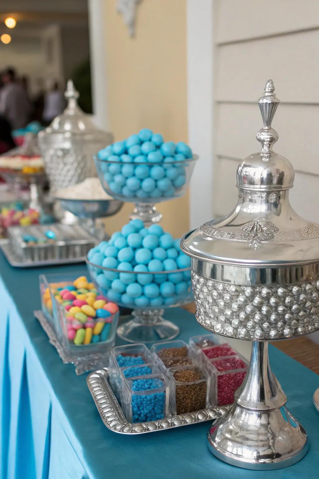 Chic metallic details that enhance the blue dessert arrangement.