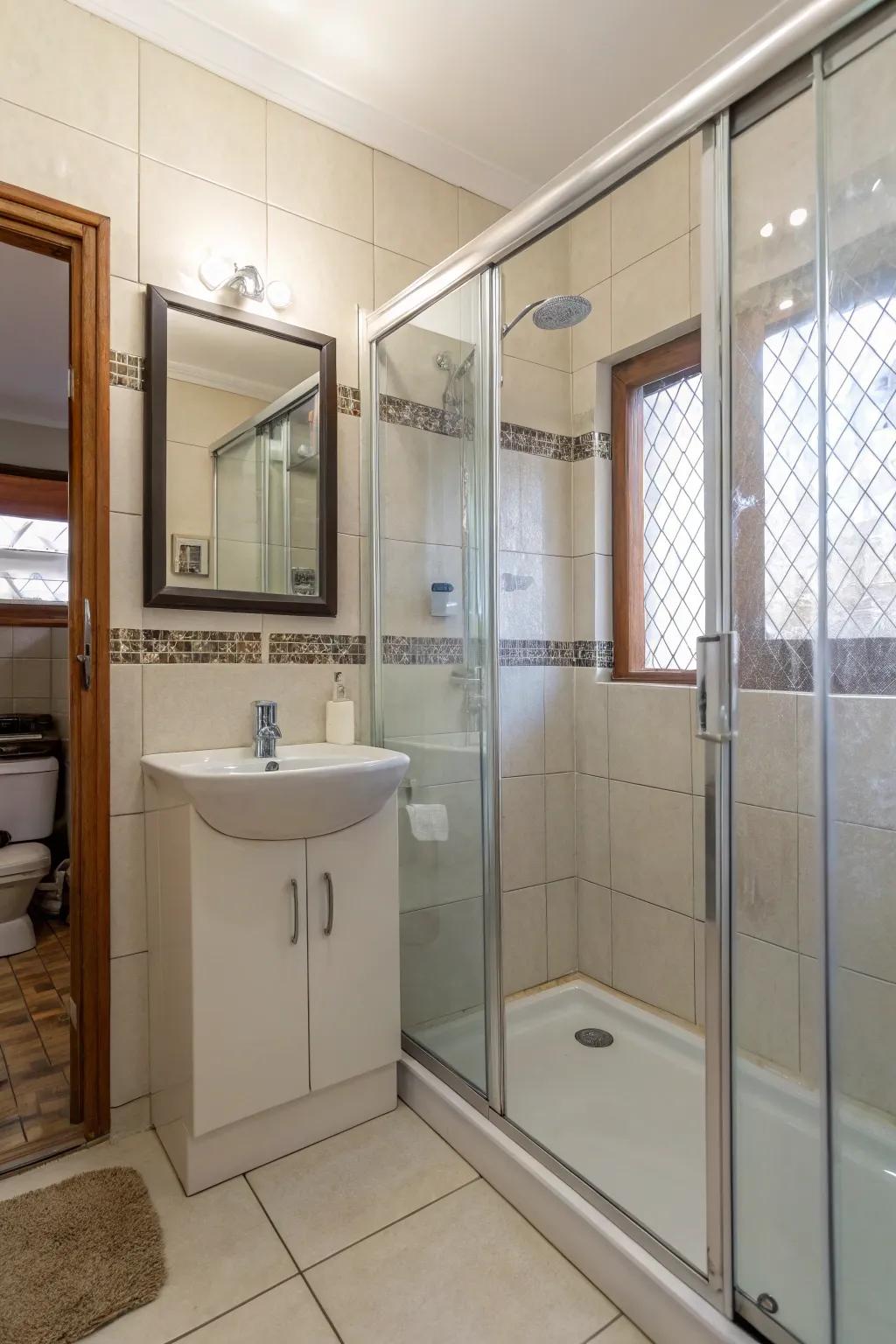 Glass shower screens foster an integrated, open ambience.
