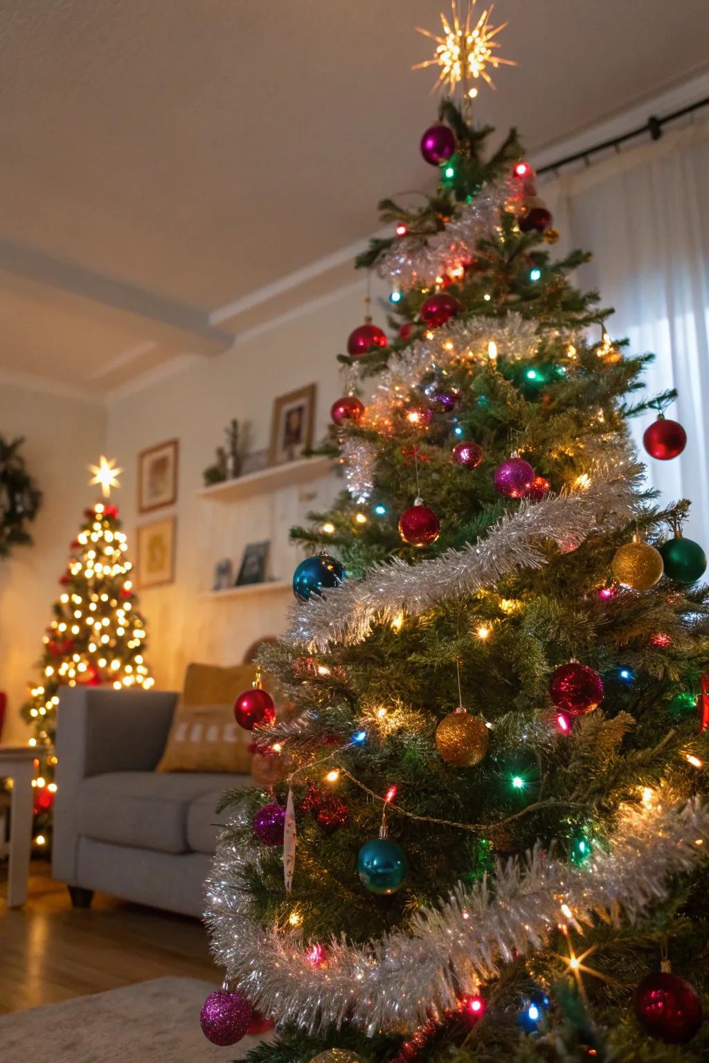 A Christmas tree glows with sparkle strands and vibrant baubles.