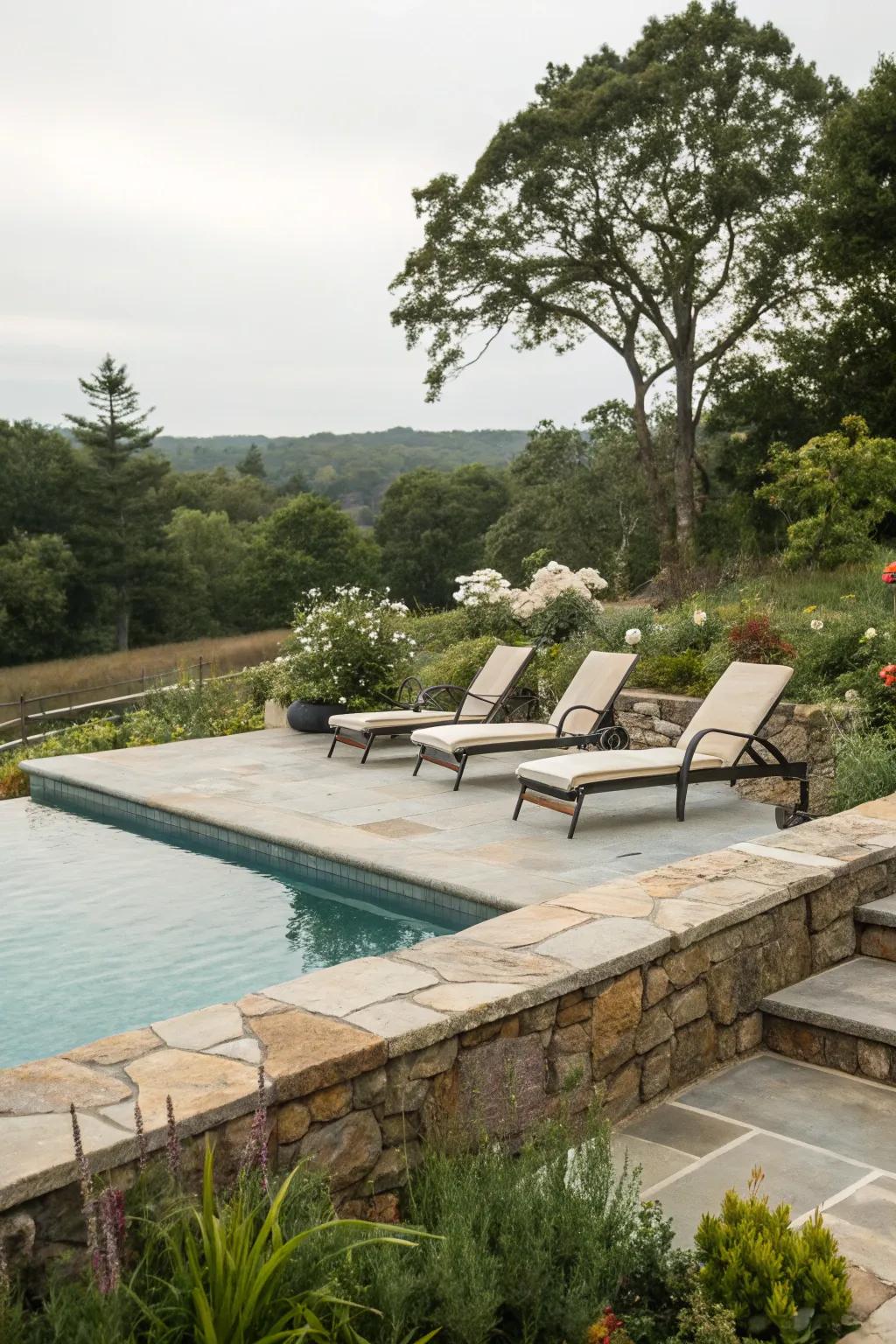 Natural stone edging frames your pool with timeless elegance.