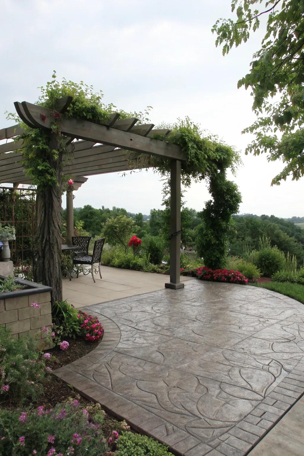 A stamped concrete patio sheltered by an elegant pergola.