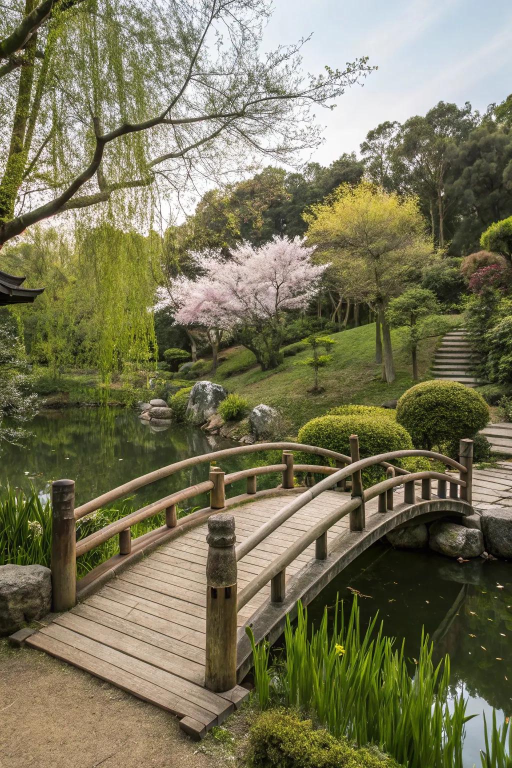 A rustic wood span over a pond in a Japanese garden.