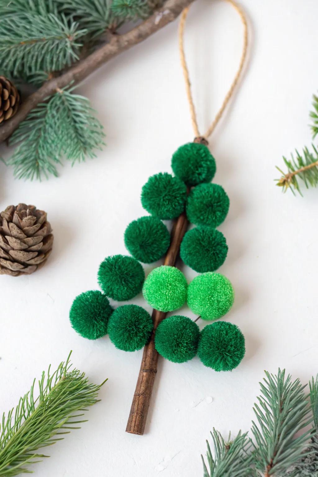 A delightful pom-pom Christmas tree, adding a pop of color and texture to holiday decor.