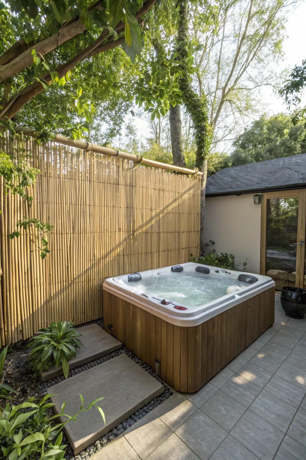 A hot tub space with a bamboo seclusion screen for a secluded atmosphere.