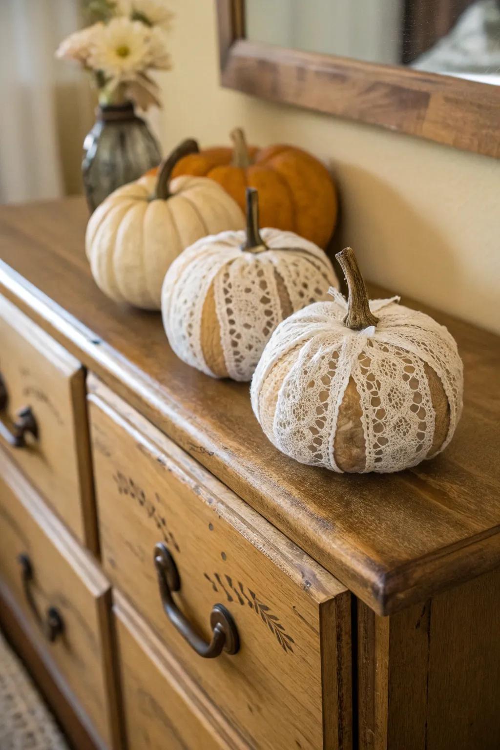 Lace-wrapped pumpkins radiate vintage charm and elegance.