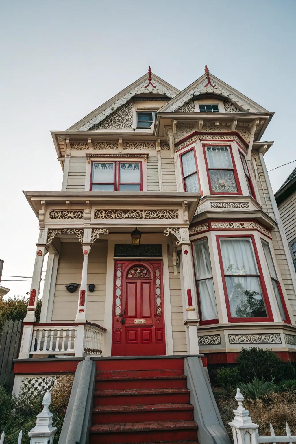 Scarlet embellishments create a striking impression on Victorian architecture.