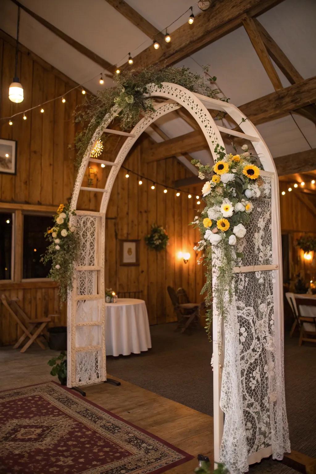 A vintage-inspired arch with wildflowers and lace for a nostalgic feel.