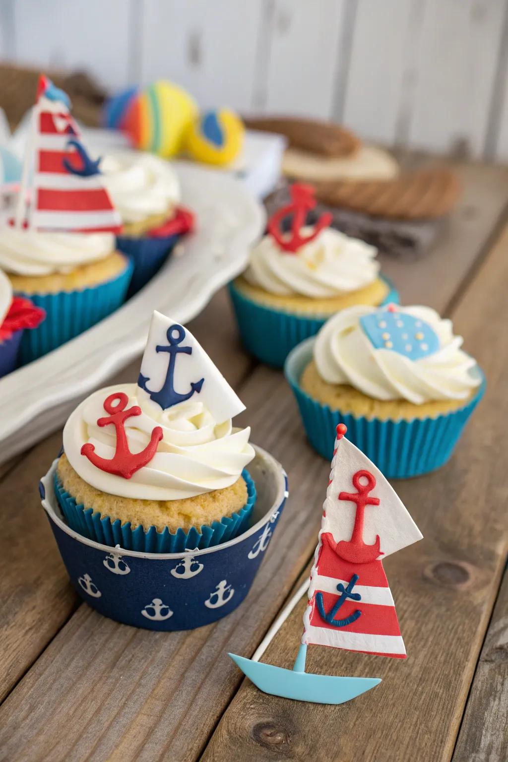 Coastal-themed cupcakes establish the scene for a maritime celebration.