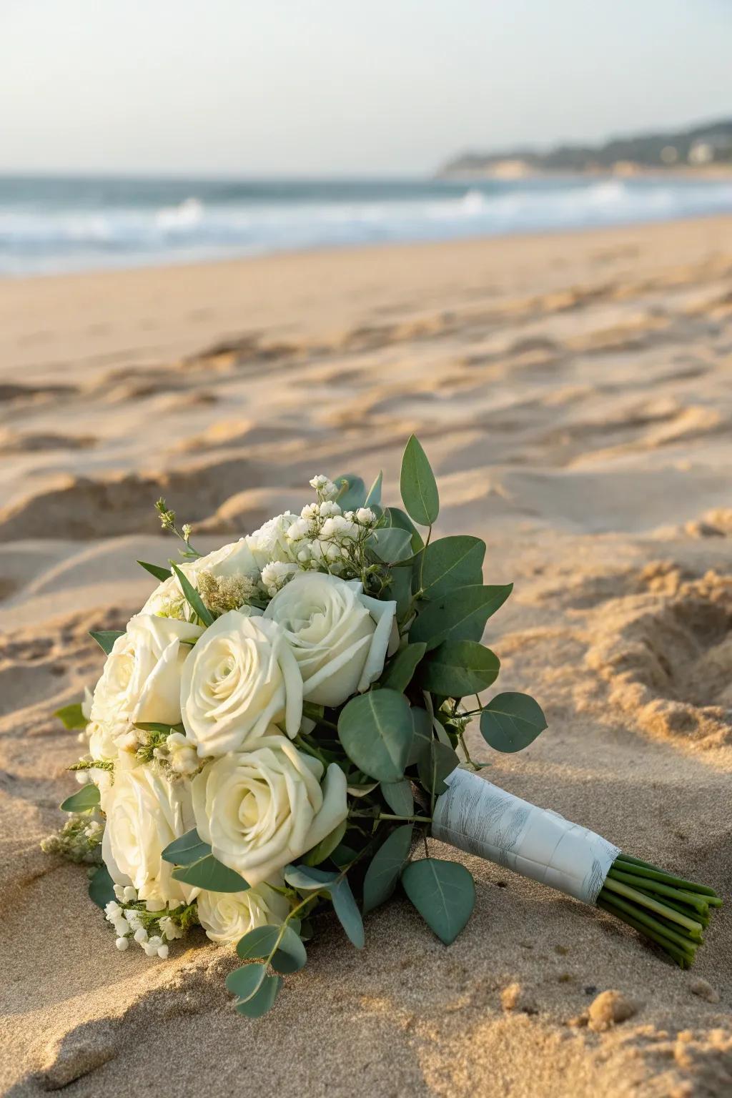 An understated white bouquet for a traditional beach wedding.