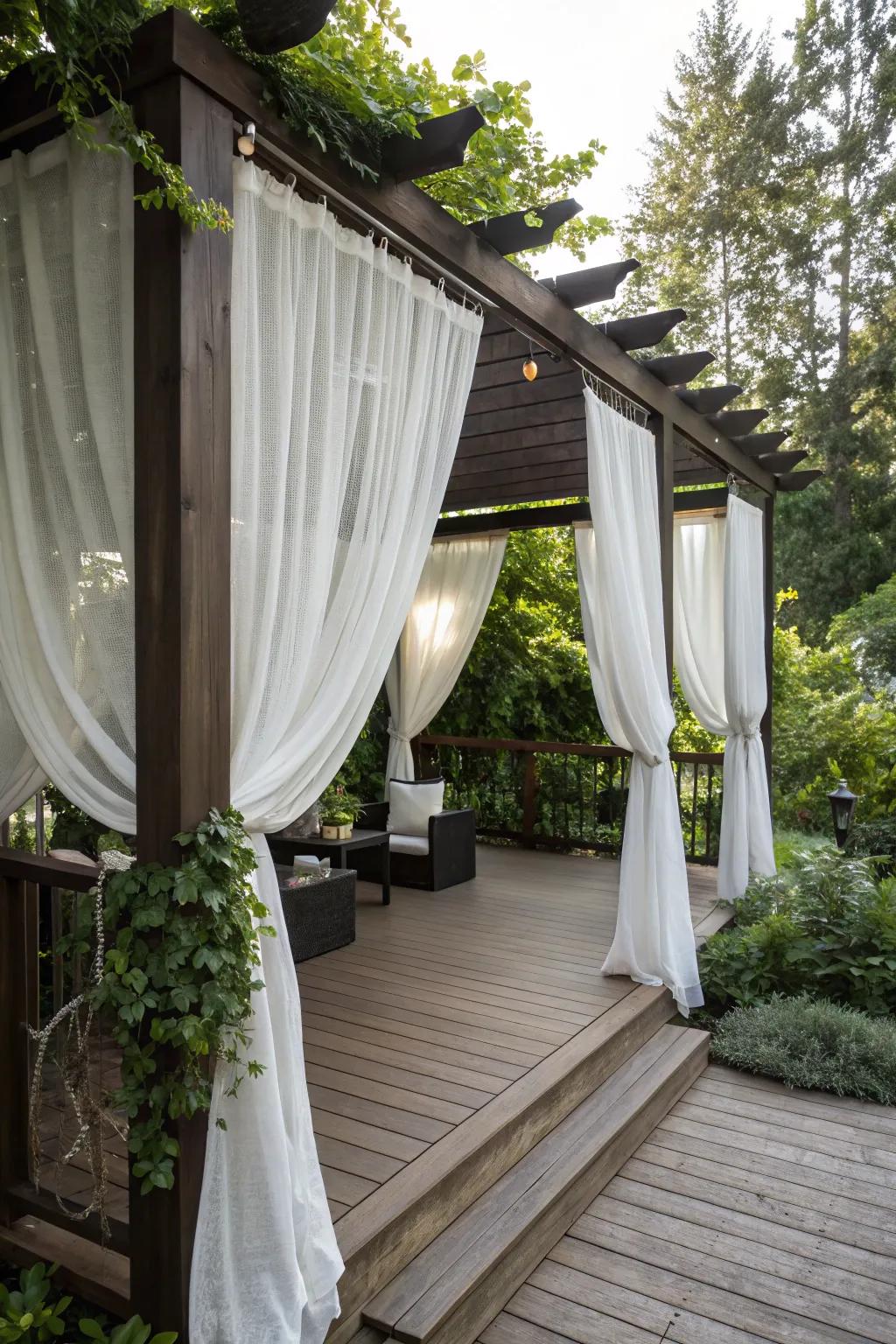 A pergola with fabrics for privacy and a cozy ambiance.