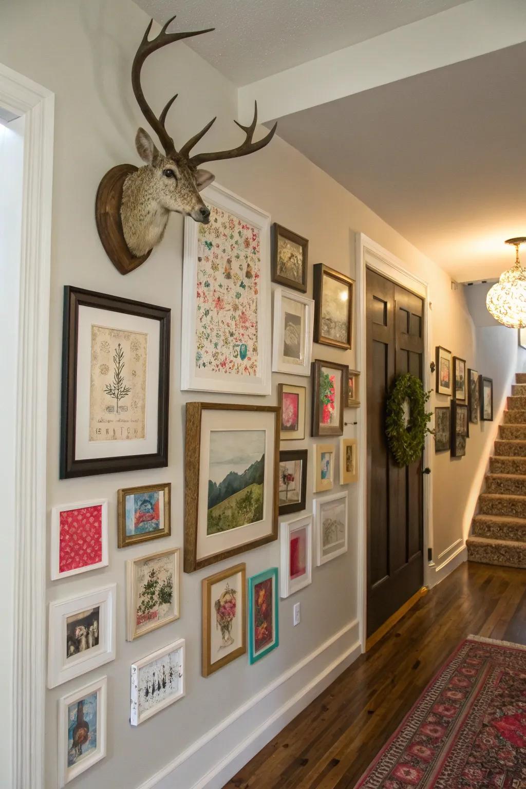 A varied gallery wall highlights a deer skull beautifully.