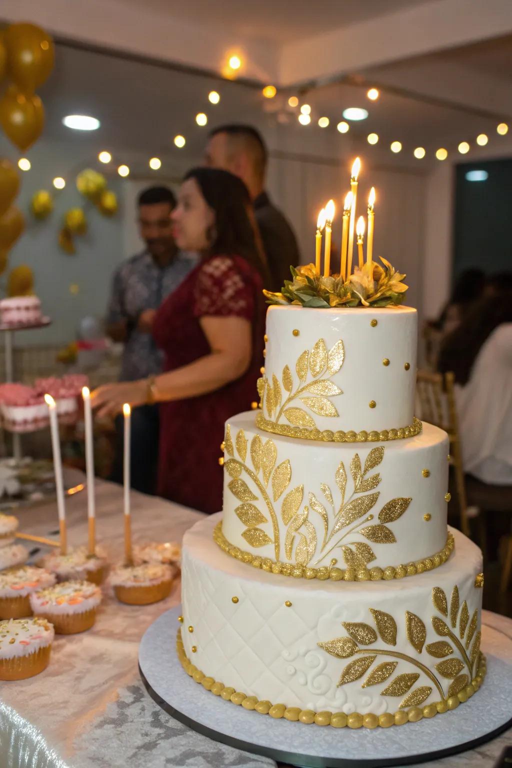 A stunning tiered cake with gold accents.