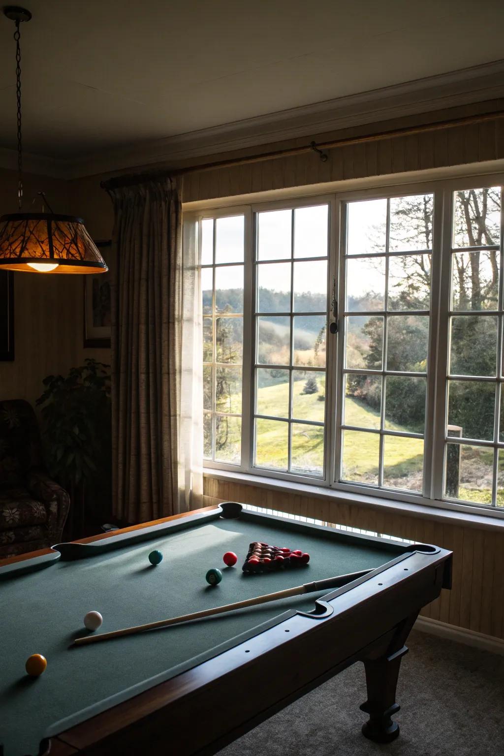Sunshine floods the billiard table area, amplifying its coziness and spaciousness.