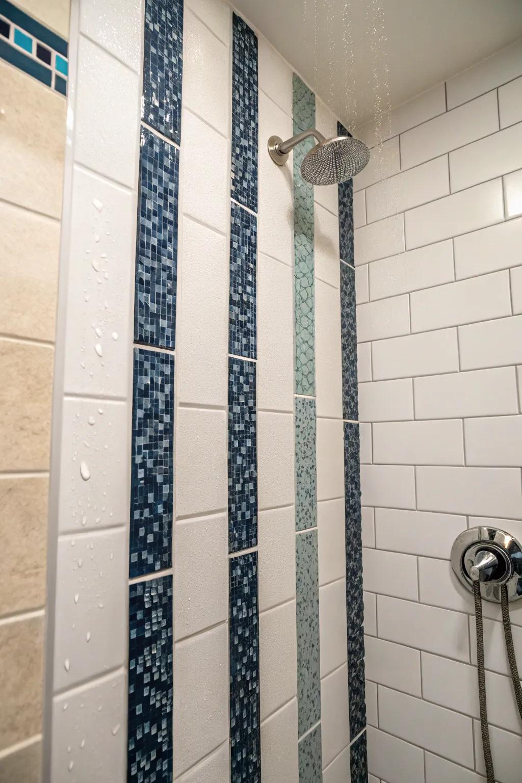 Vertical stripes in accent tiles can enhance the perceived height of the shower.