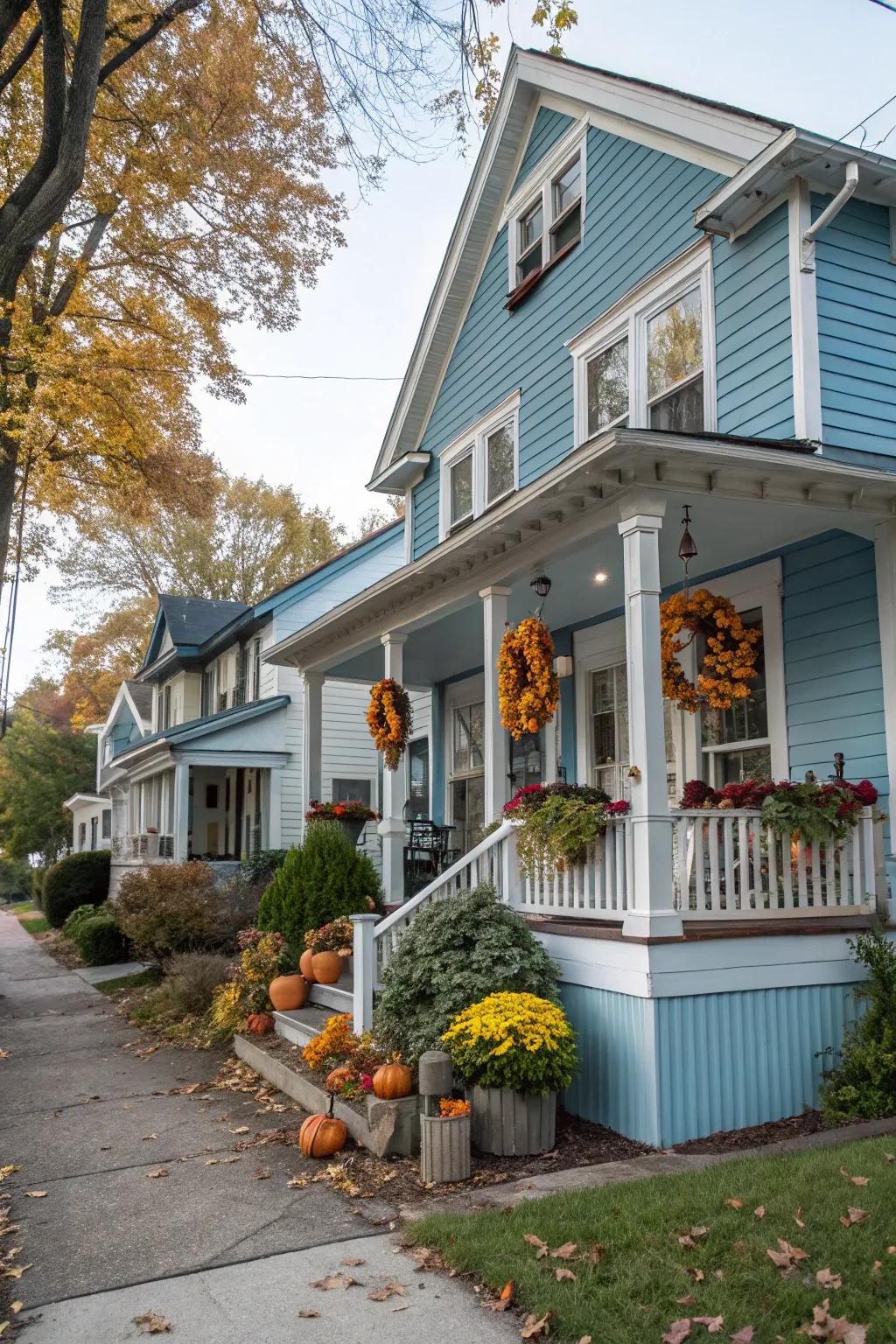 Seasonal decorations keep your blue house looking lively and welcoming.
