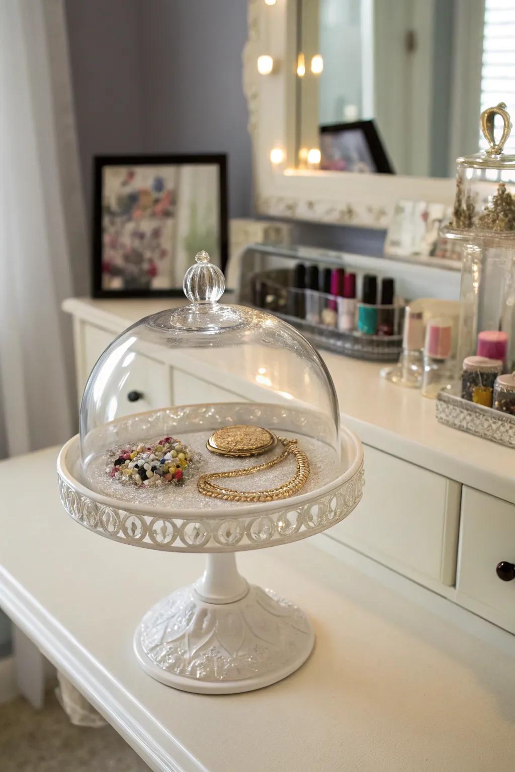 Arrange your jewelry pieces with class beneath a crystal dome.