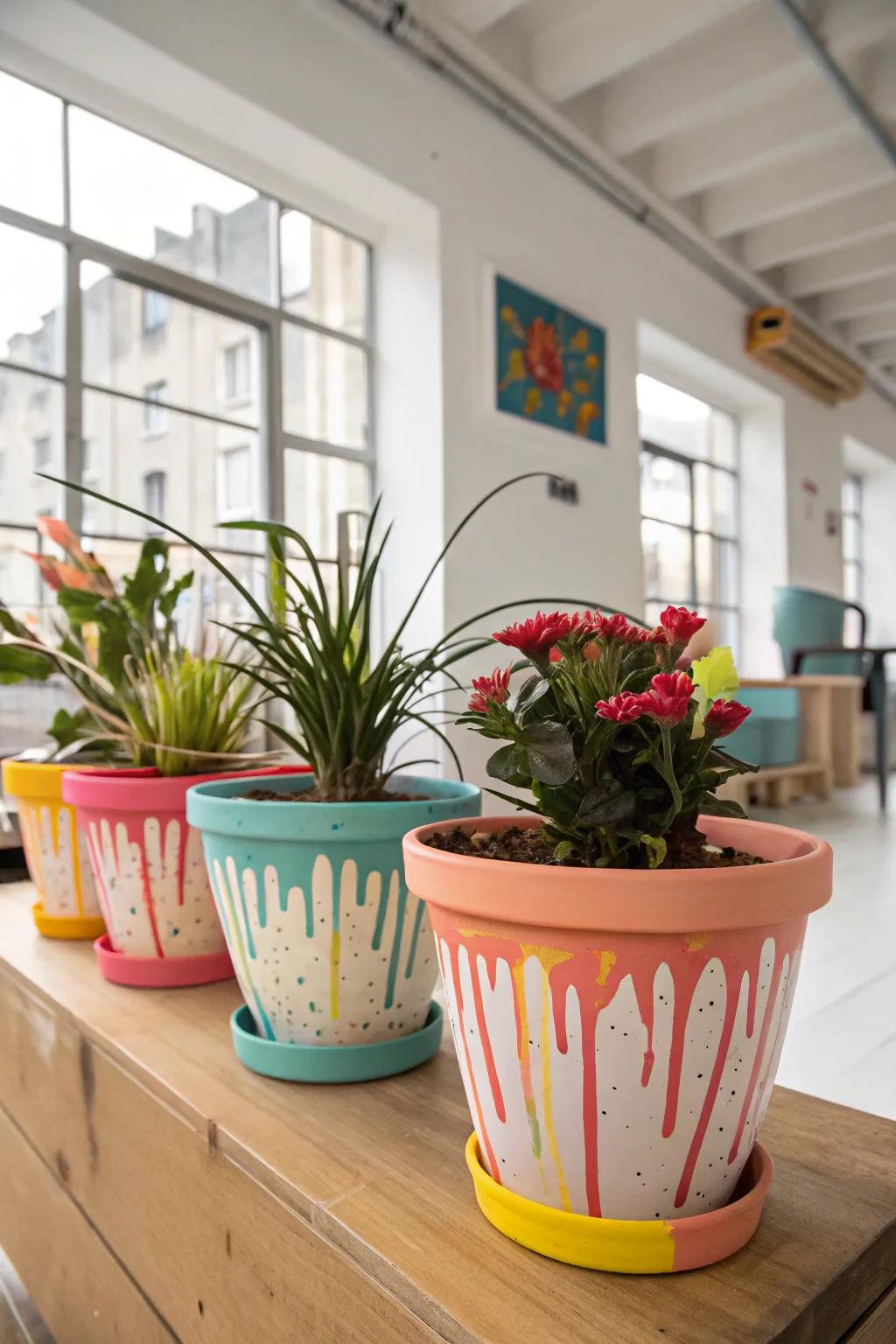 Drip-painted flower containers making a bold artistic statement.