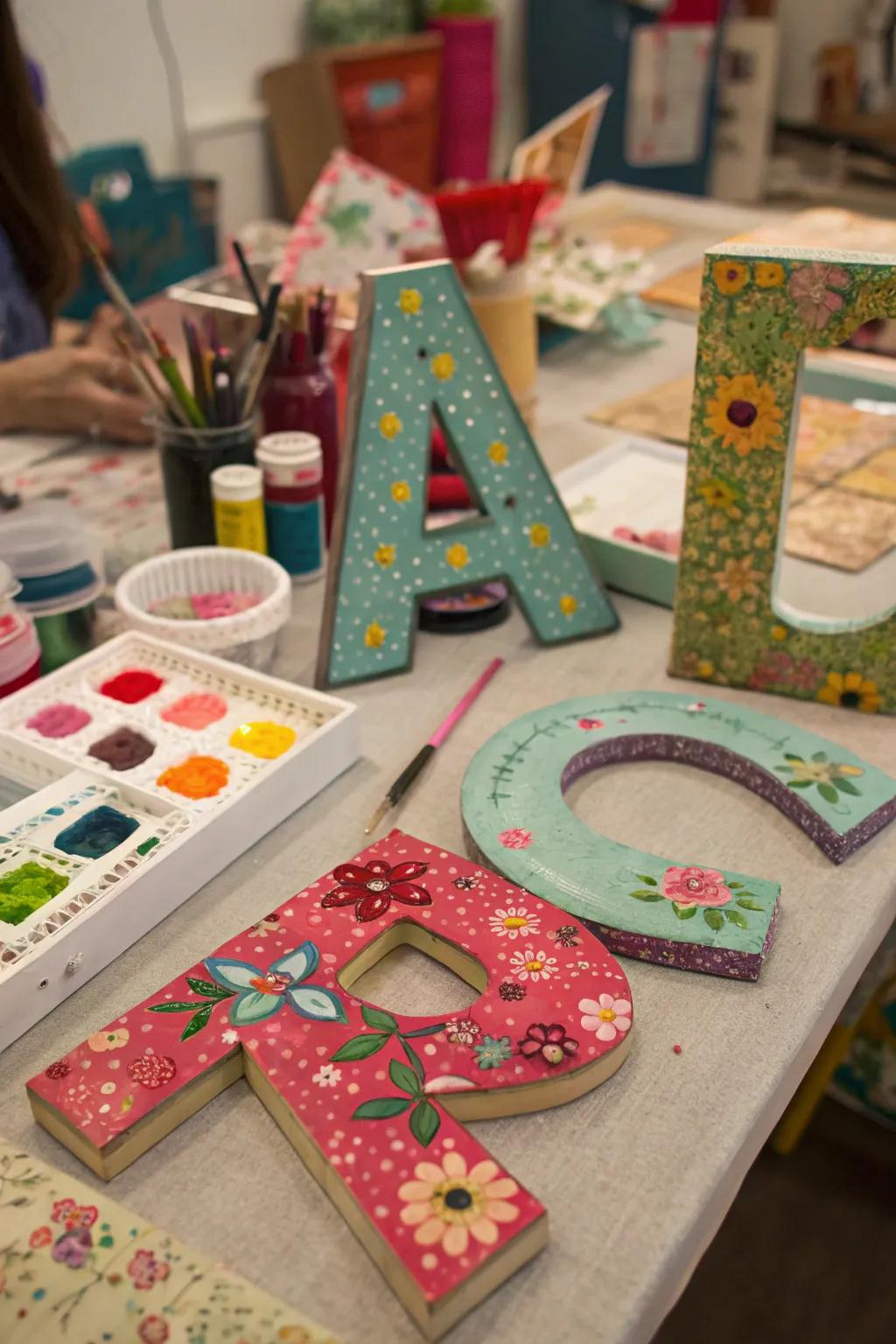 Mixed media letters using a variety of textures.