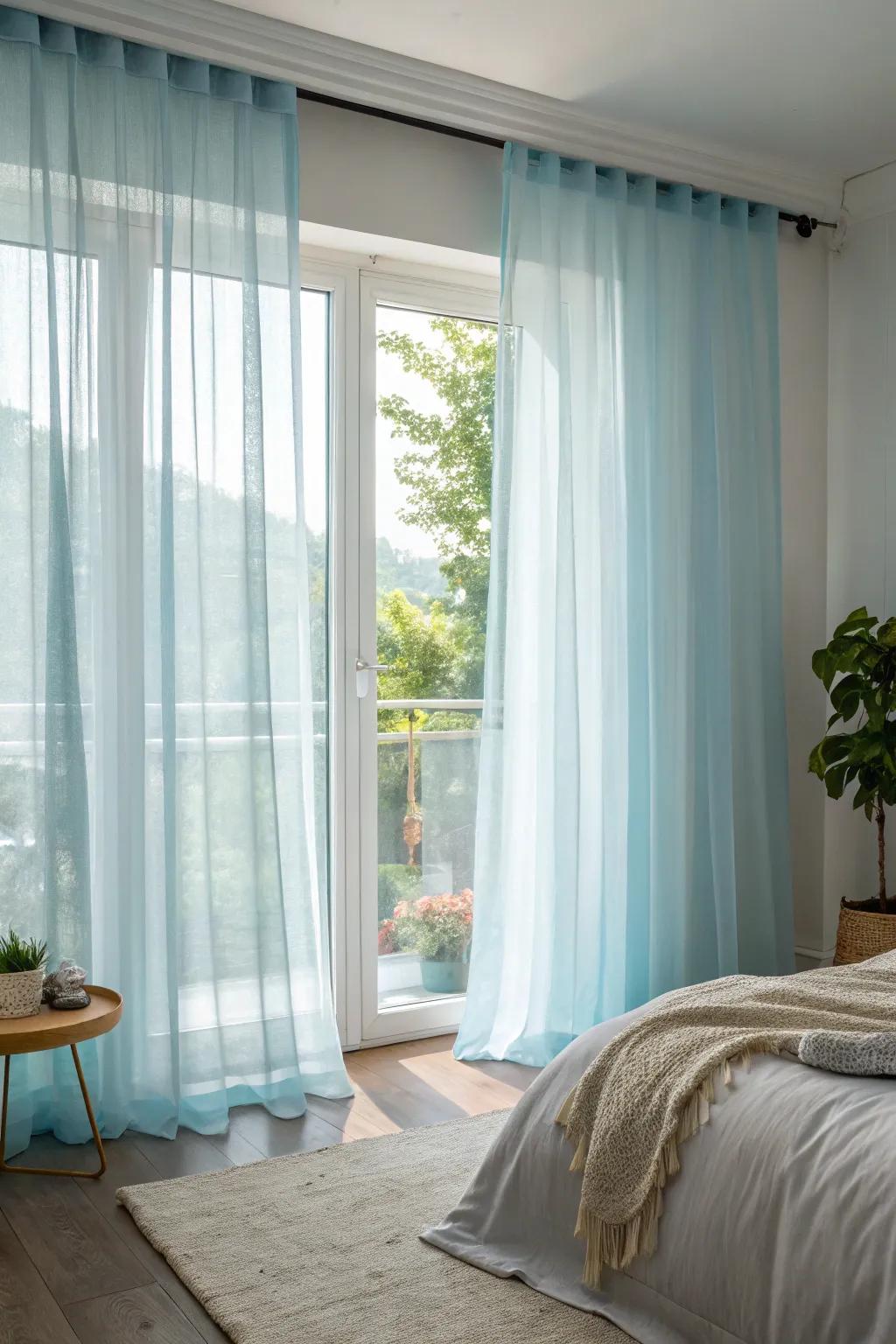 The light blue drapes enhance the airiness and brightness within the bedroom.