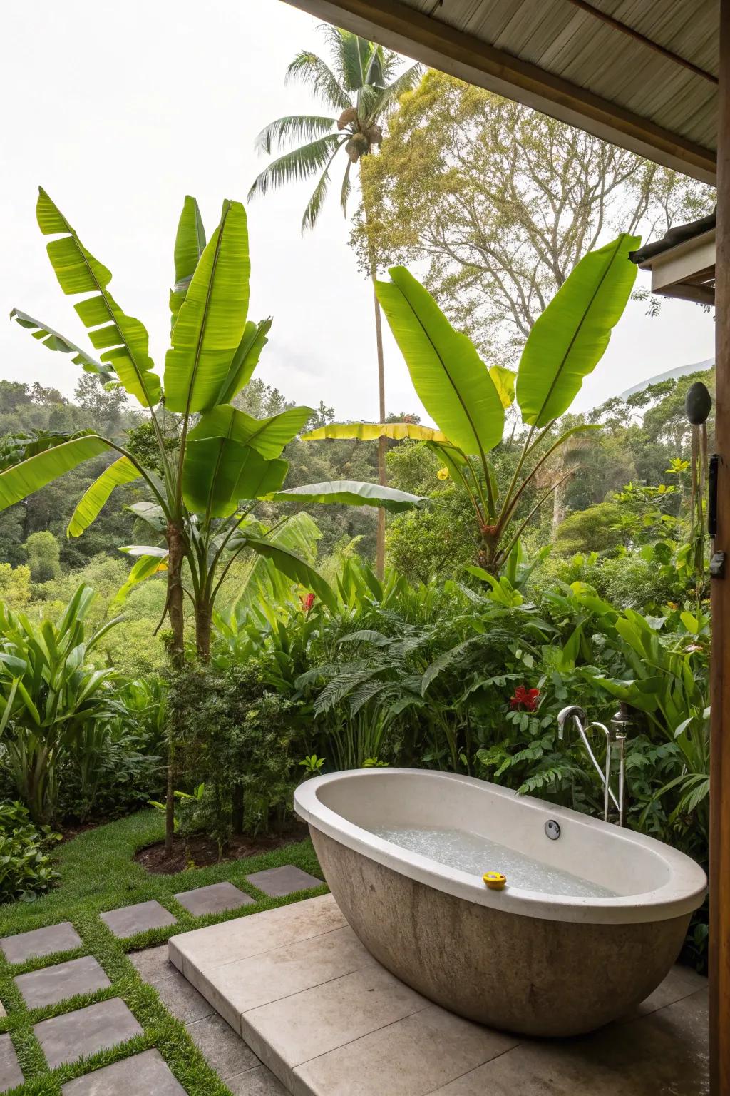 Transport yourself to a tropical paradise using vibrant greenery around your tub.