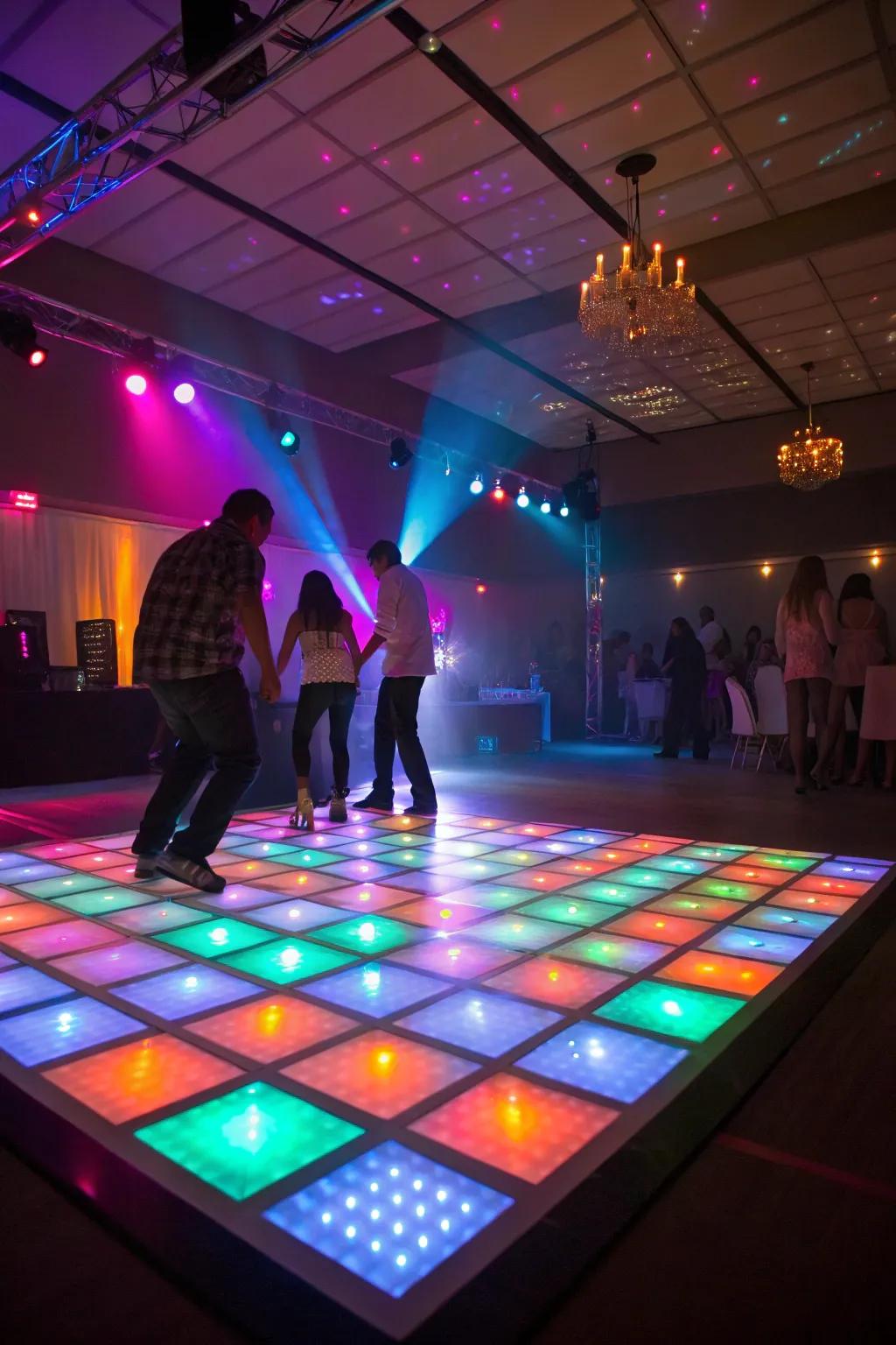 An illuminated dance space beckons guests to dance the night away.