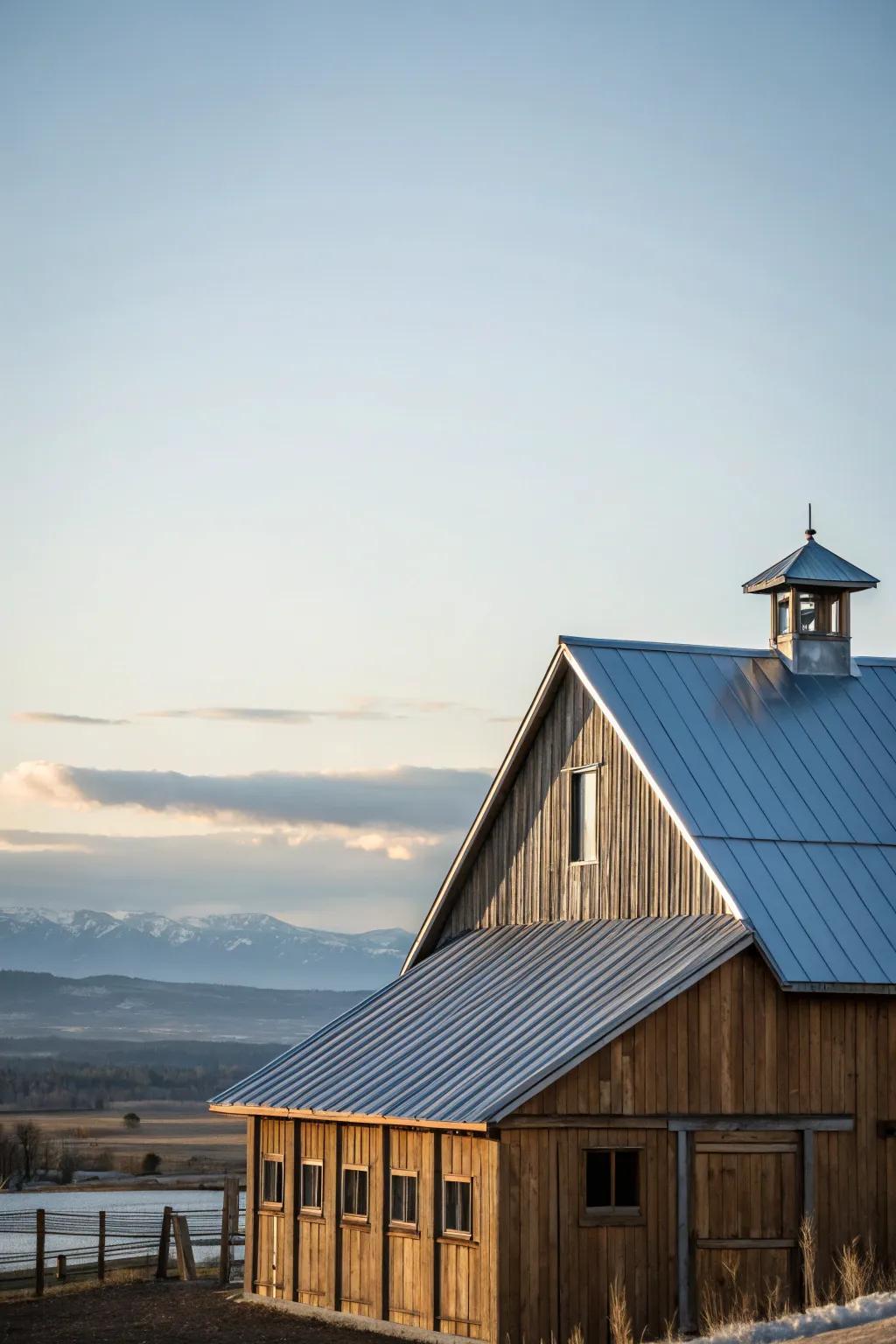 A barn house featuring a sleek and sturdy metal roof.