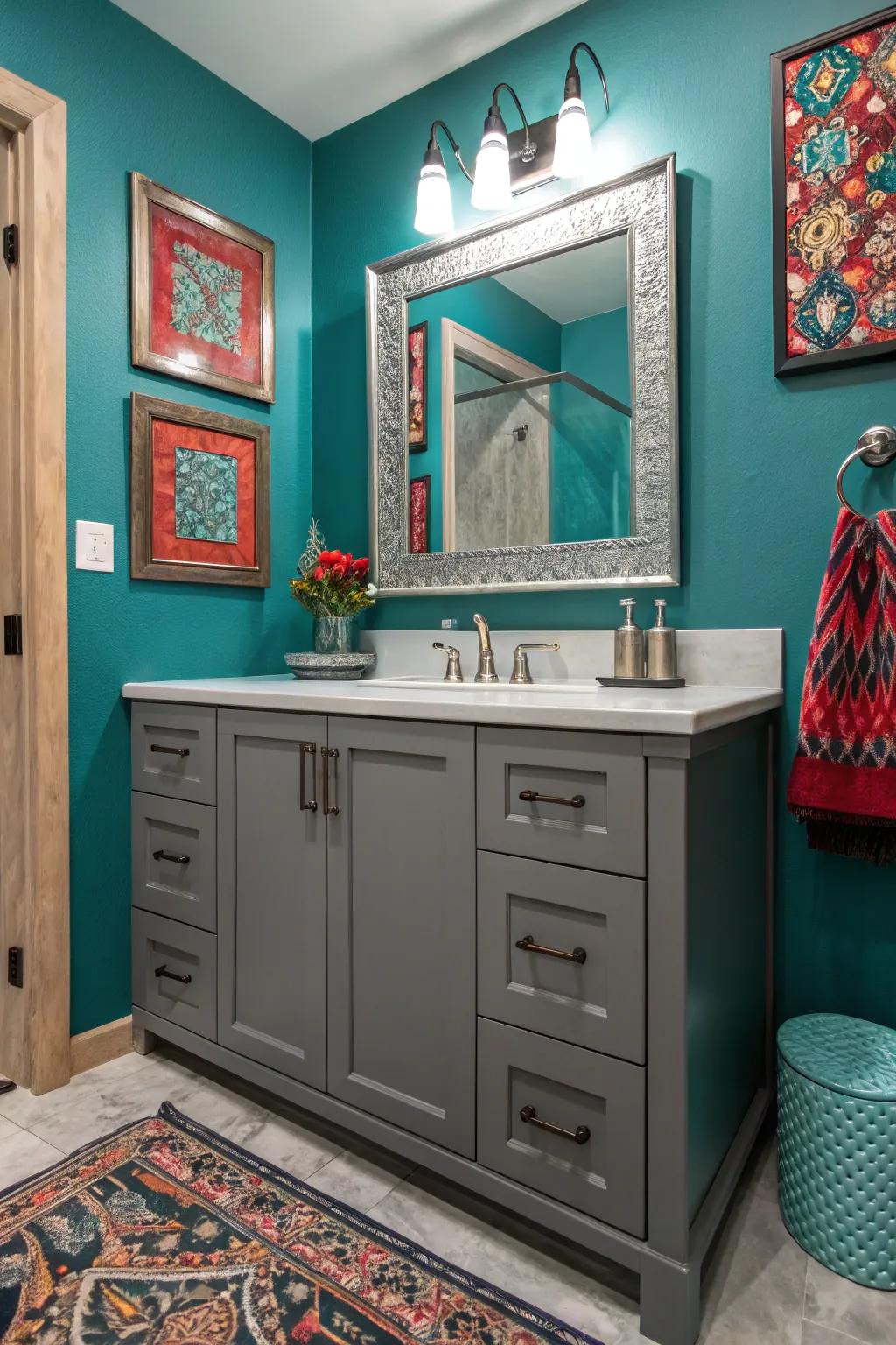 Vivid tones such as teal introduce drama to the grey vanity arrangement.